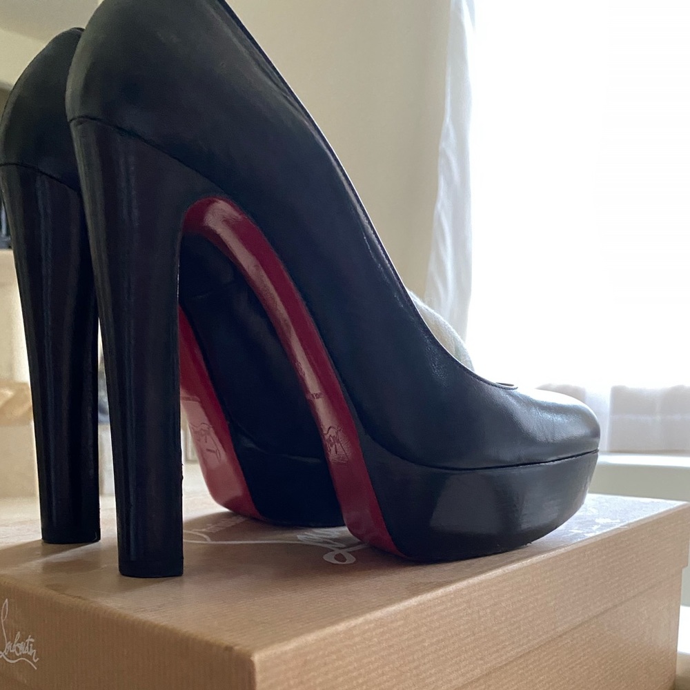 Christian Louboutin black pumps